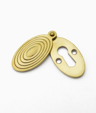 Unlacquered Polished Brass Oval Reeded Covered Escutcheon