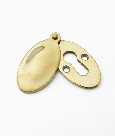 Unlacquered Polished Brass Plain Oval Covered Escutcheon