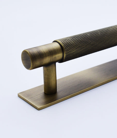 Leon Partial Knurled Cabinet Pull Handle On Plate